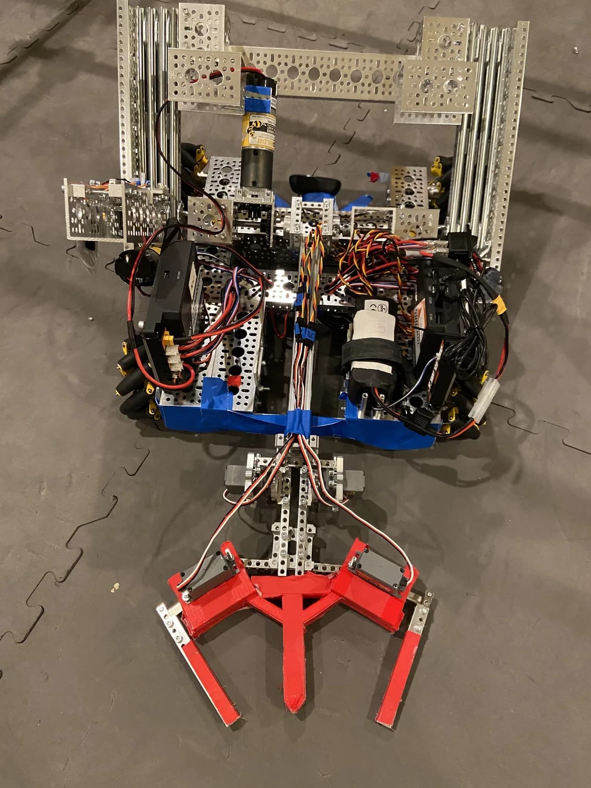 Bob v3, the Centerstage robot, from above with its red three-prong claw extended