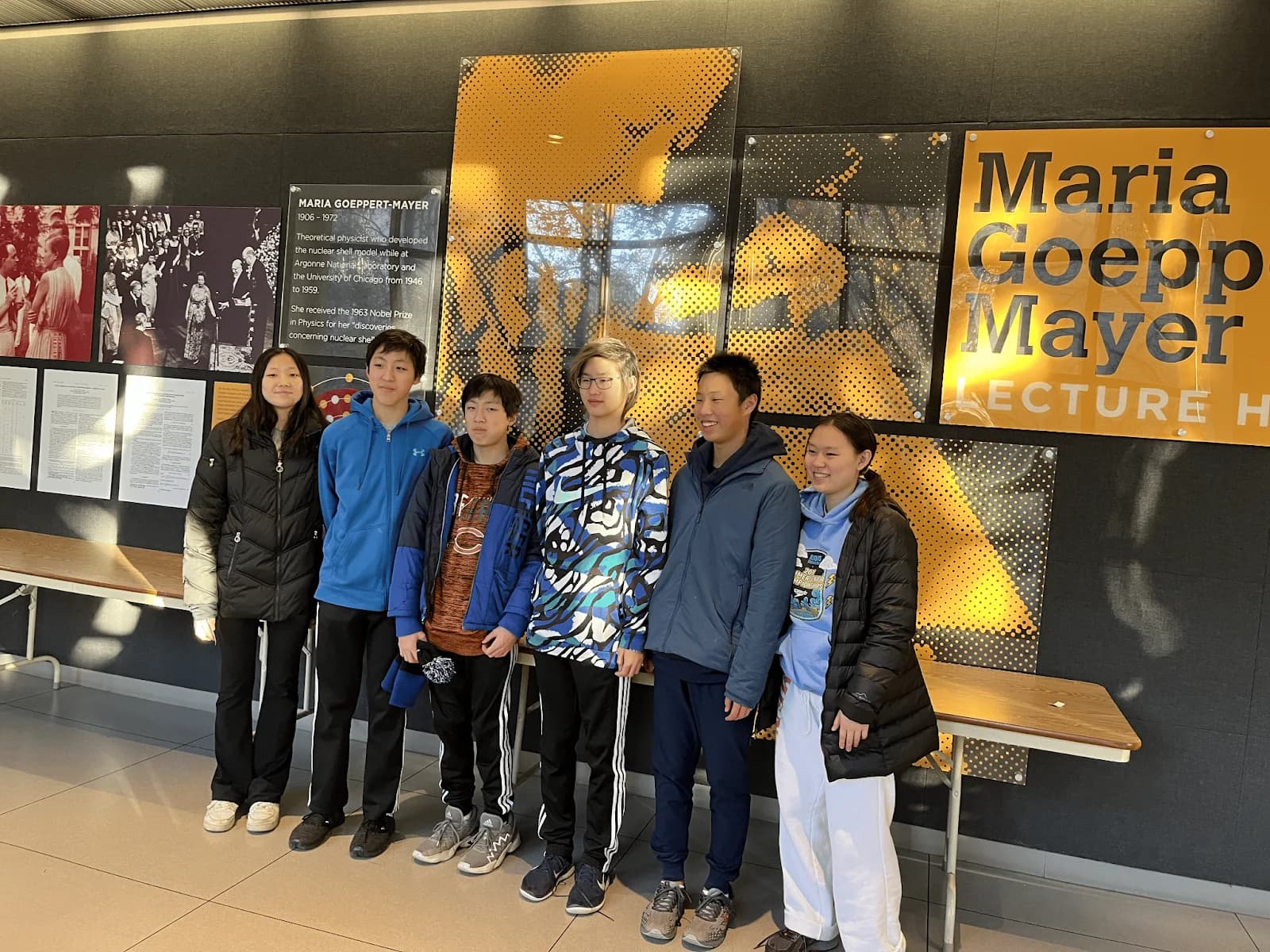 The 2022-23 Techineers in front of a lecture hall wall